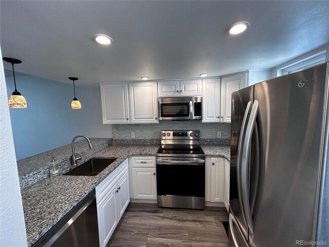 Building Photo - 7250 Devinney Ct Unit E