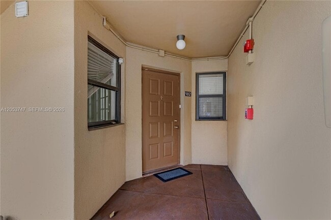 Building Photo - 15545 Miami Lakeway N Unit 102