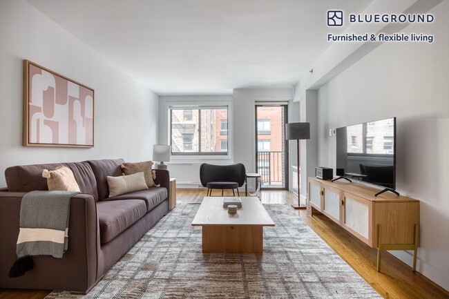 Building Photo - 101 W 15th St Unit SI FL5-ID1224