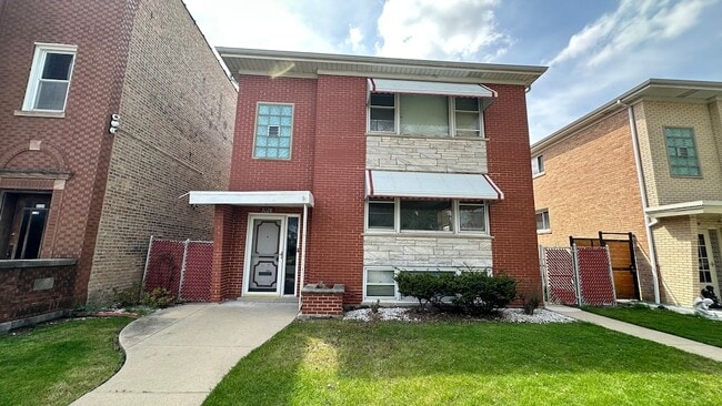 Building Photo - 5128 N Long Ave Unit 1