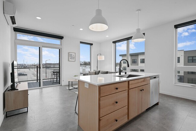 Furnished Living Room & Kitchen - The Common Place Apartments