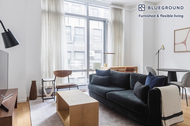 Building Photo - 18 W 48th St Unit FL8-ID1643