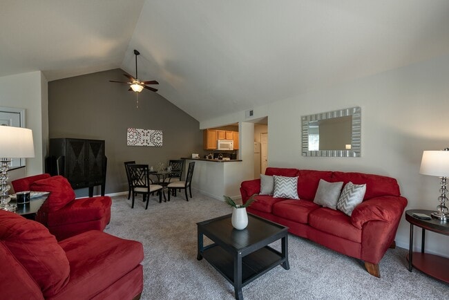 Open concept living area with vaulted ceilings - Shadowmoss Pointe Apartments and Townhomes