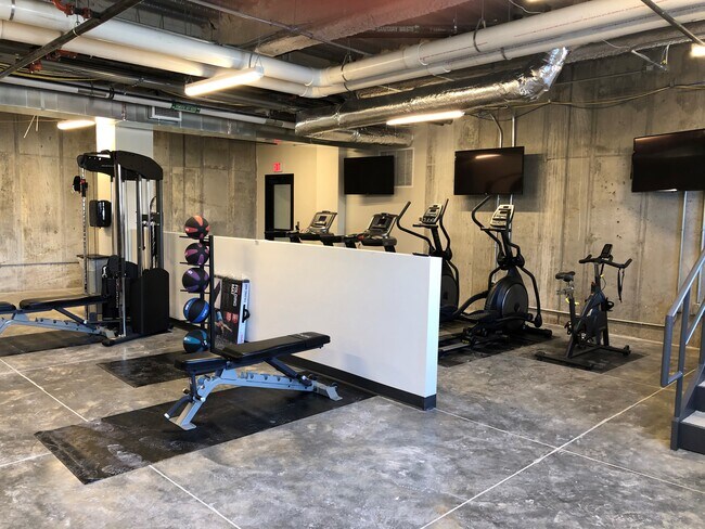 Fitness Center - The Traveler Apartments