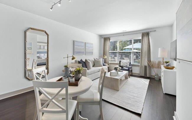 Modern Apartment Living Room Connected to Dining Space - The Landing at Vinnin Square