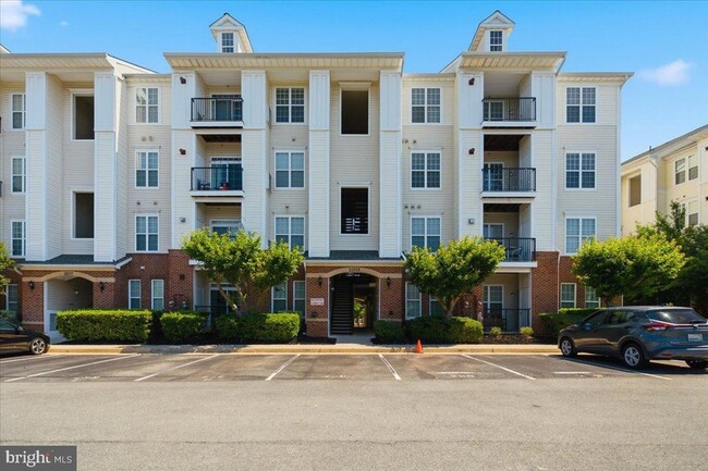 Building Photo - 21228 McFadden Square Unit 314