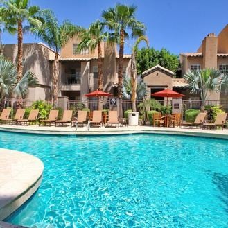 Relax by the Sparkling Pool Year-Round. - The Allison Condominiums