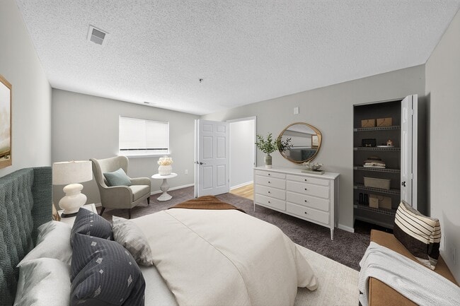 Elevate your lifestyle at Eagle Rock Apartments at Belcamp. This stylish bedroom offers a serene retreat with modern finishes and abundant natural light. Ideal for relaxation and comfort, it’s the perfect place to call home. Schedule a tour today! - Eagle Rock Apartments at Belcamp
