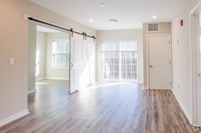 Living Space with French Balcony - The View At Mine Hill