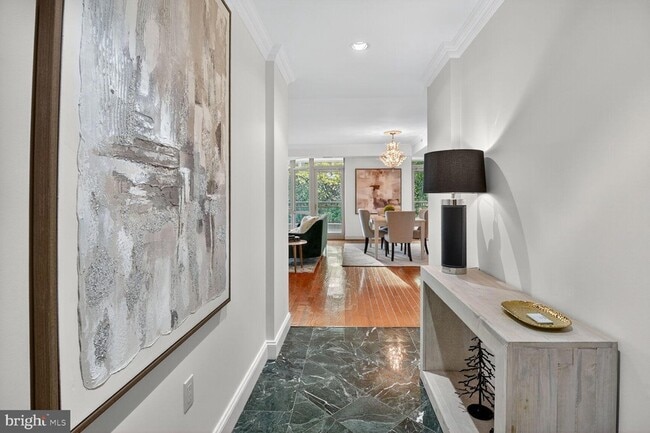 Building Photo - 5630 Wisconsin Ave Unit 406