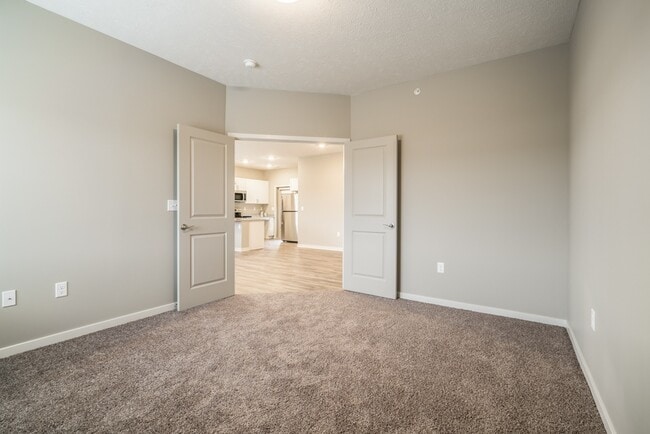 Our Casper floor plan has a spacious den - perfect for an office space. - The Villas at Falling Waters