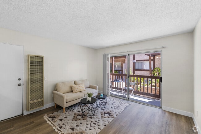 1BR, 1BA - 600SF - Living Room - Collins Condominiums