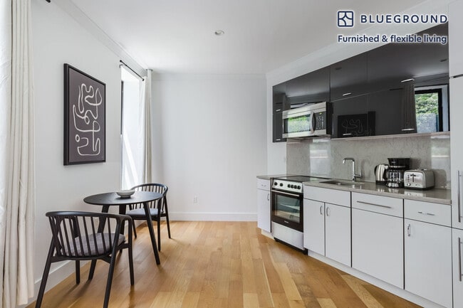 Photo - 403 E 69th St Unit FL2-ID1498