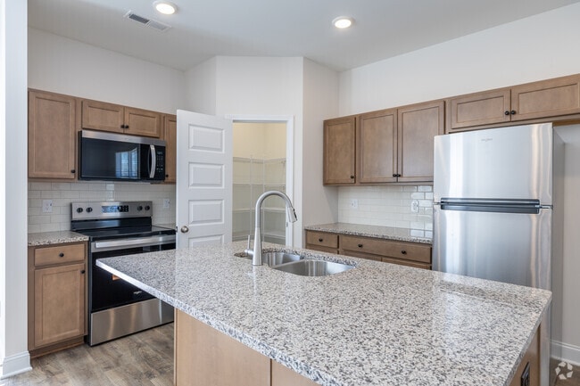 3BR, 2BA - 1,510SF - Kitchen - Walton Farms