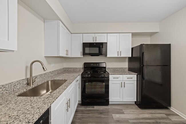 Building Photo - The Winds at Poplar Creek