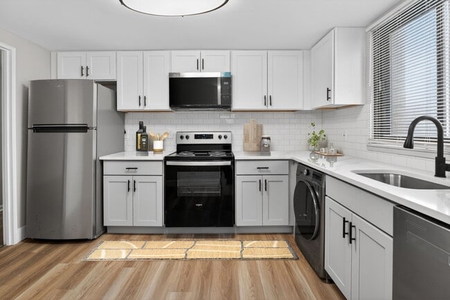 Step into modern living at The Venue Apartment Homes, where sleek design meets functionality. Enjoy spacious kitchens with stainless steel appliances and stylish finishes. Elevate your lifestyle today—schedule a tour now! - The Venue Apartment Homes