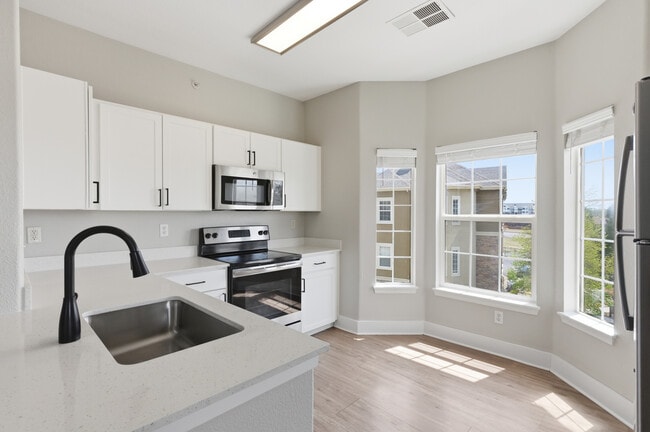 Kitchens designed for function and flair. - Grove at Cherry Creek Park