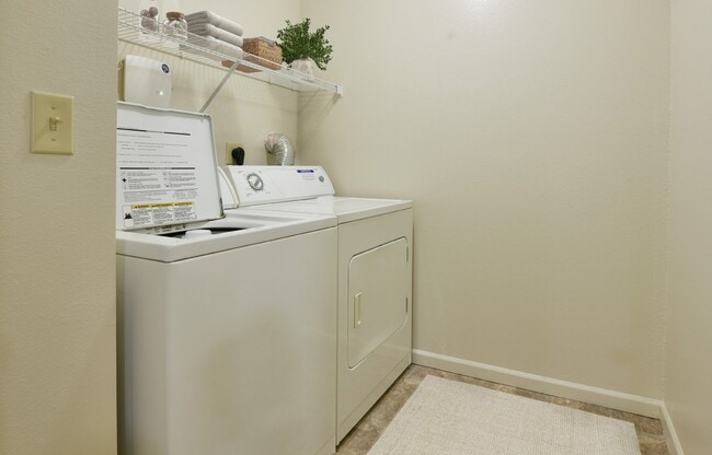 The in-unit washer and dryer at Heatherwood Apartments, Grand Blanc, Michigan - Heatherwood Apartments