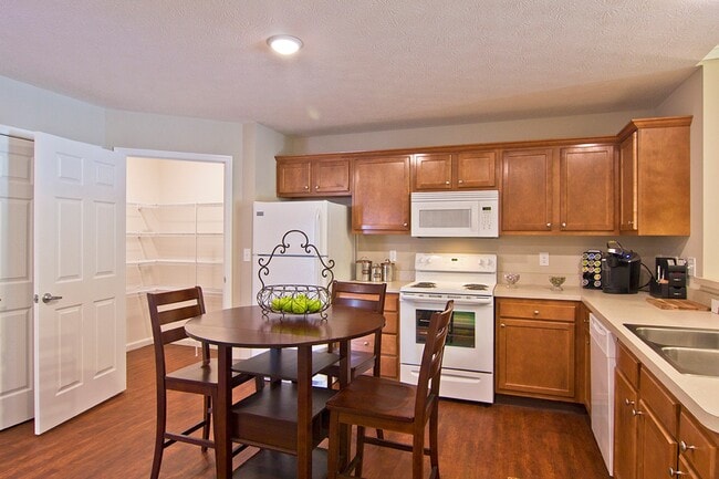 Spacious Kitchens with Breakfast Bar and Room for a Table - Redwood Fort Wayne Wallen Road