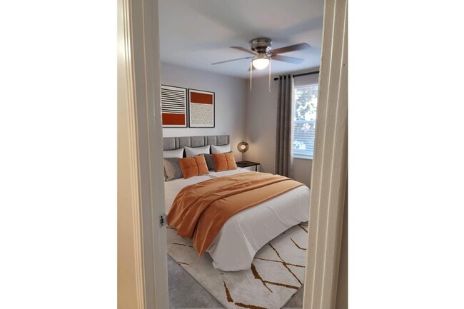 ELEGANT BEDROOM WITH CEILING FANS - Eagles Crest at Wallace