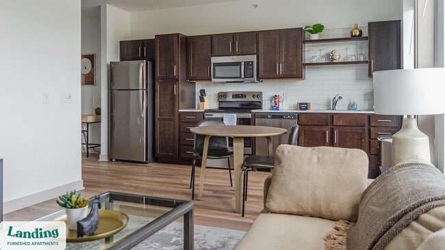 Building Photo - 5811 Main St Unit 2-203.1407299