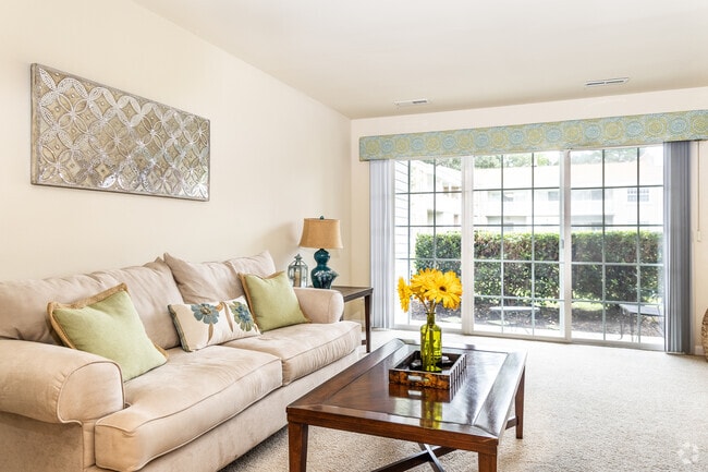 1BR, 1BA - 868SF - The Lilac - Living Room - Thalia Gardens Apartments and Townhomes