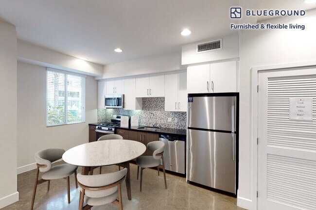 Photo - 6700 Warner Ave Unit FL1-ID4146A