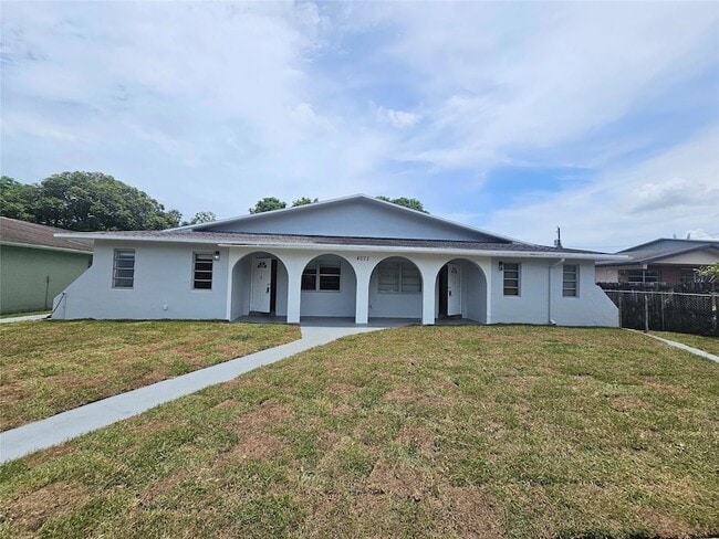 Building Photo - 4072 SW 51st St Unit 1