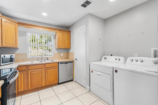 Kitchen & Laundry - Palm Bay Club