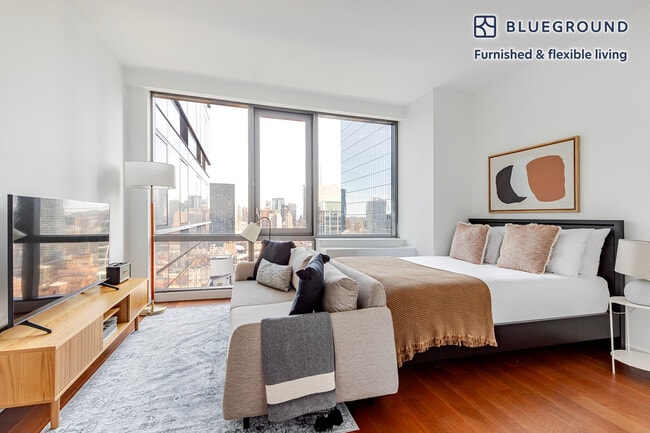 Building Photo - 435 W 31st St Unit FL33-ID1783