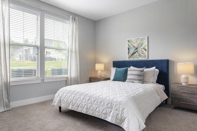 Step into this serene bedroom retreat, where modern design meets comfort. - Lemmond Farm