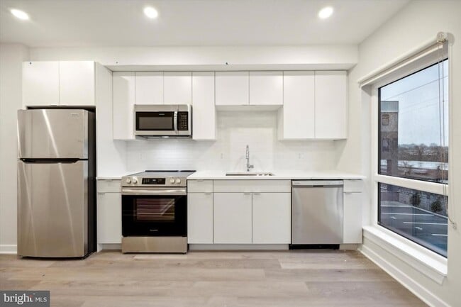 Building Photo - 3449 Scotts Ln Unit A306