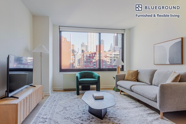 Building Photo - 180 W 20th St Unit FL12-ID2140