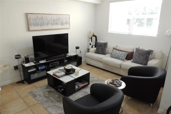 Building Photo - 8899 NW 107 Ct Unit 209