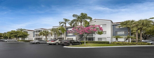 Parking area with exterior building view - Avana at the Moors