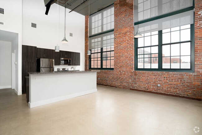 2BR, 2.5BA - 1,198SF - Dining/Living Room - Capewell Lofts