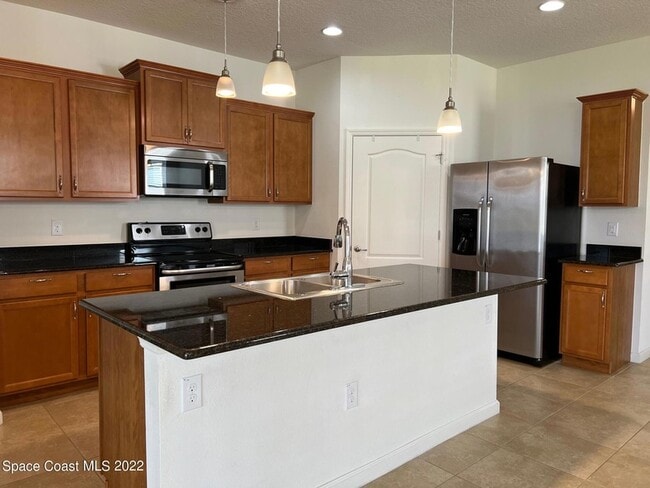 Photo - 728 Remington Green Dr SE