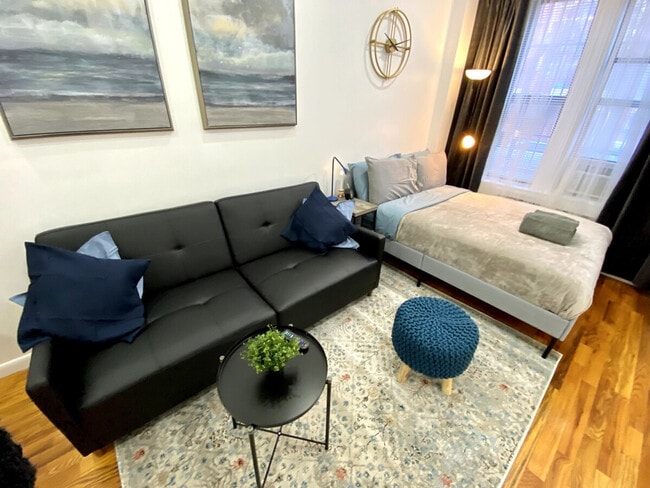 Building Photo - 310 E 103rd St Unit ID1032007P