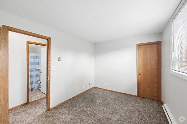 2BR, 1BA - 665SF - First Bedroom - St. Charles Court Apartments