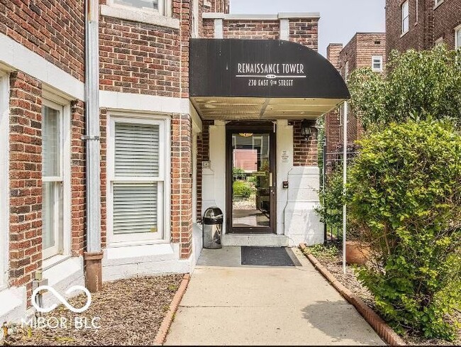 Building Photo - 230 E 9th St Unit 304