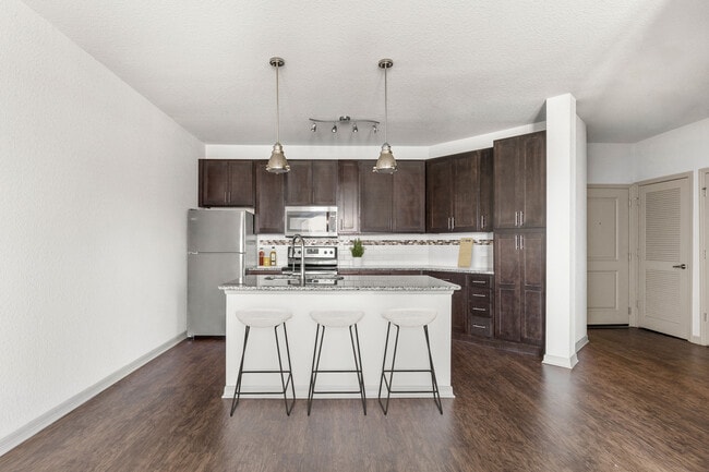 Cook, dine, and gather in a stylish kitchen space. - Sands Parc