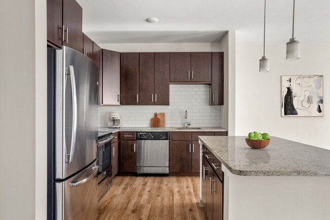Sleek kitchen finishes and smart storage keep your space beautiful and practical - River Birch at Watertown