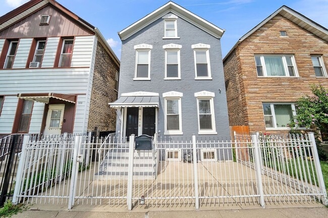 Building Photo - 3816 S Honore St Unit 1