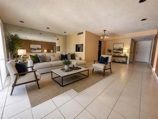 Building Photo - 3360 Spanish Moss Terrace Unit 206