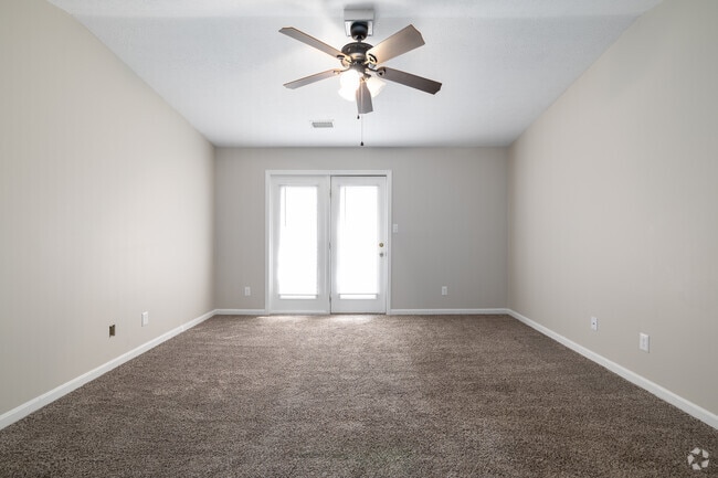 2BR, 2BA - 894SF Living Room - Deer Park Apartments