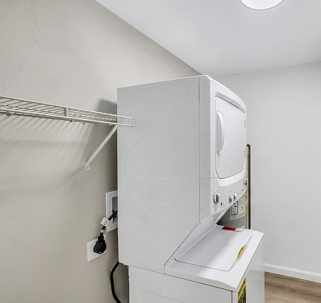 Stacked Washer and Dryer - Green Tree Apartments