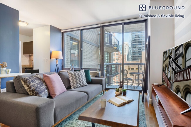 Building Photo - 235 W 48th St Unit FL19-ID142