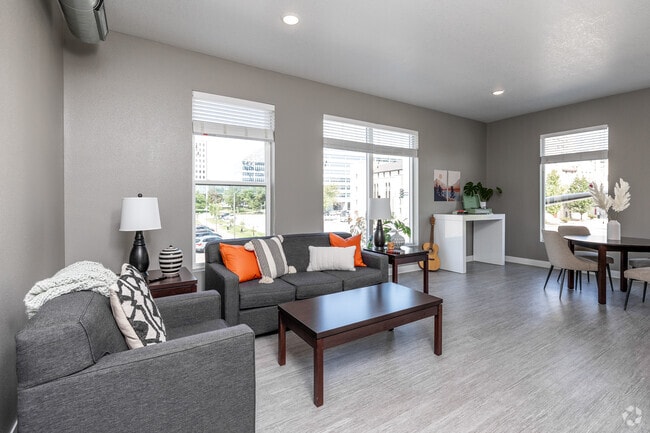 1BR, 1BA - A13/929 SF - Living Room - Carbon 550