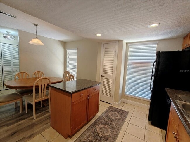 Building Photo - 1810 NW 23rd Blvd Unit 165