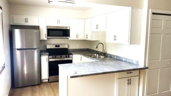 Building Photo - Campus Park Apartments & Commercial